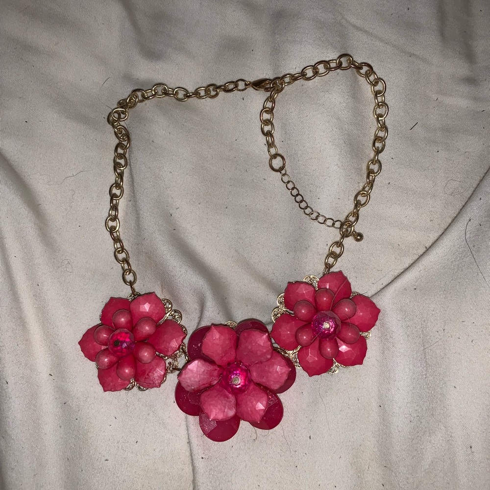 pink flower necklace.